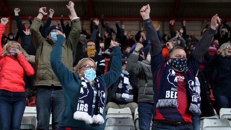 Bristol Bears fans react in the stands as they watch their team in action for the first time since March 2020