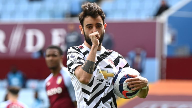 Bruno Fernandes celebrates after converting his penalty