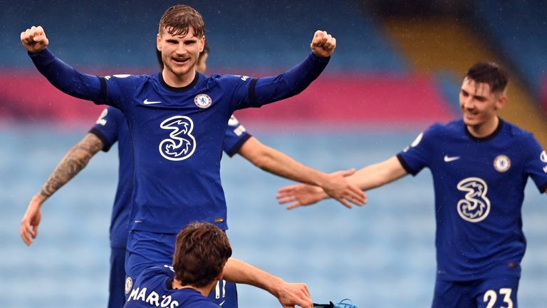 PA - Chelsea players celebrate Marcos Alonso&#39;s winner at the Etihad