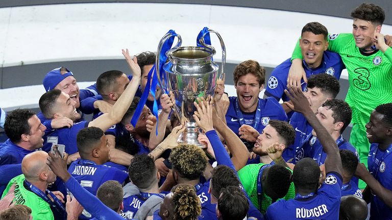 Chelsea players celebrate with the trophy after the UEFA Champions League final match held at Estadio do Dragao in Porto, Portugal