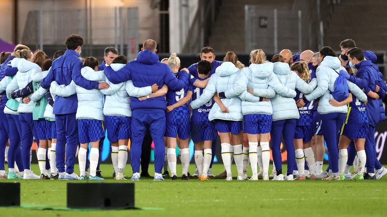 Emma Hayes speaks to her staff and players at full-time