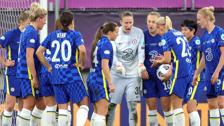 Ann-Katrin Berger tries to encourage her side after conceding a fourth goal