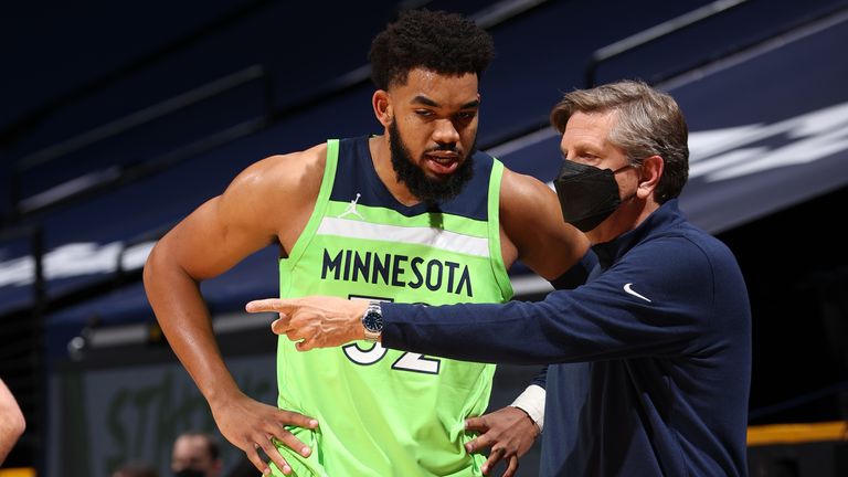 Head Coach Chris Finch of the Minnesota Timberwolves talks with Karl-Anthony Towns #32 during the game against the Houston Rockets on March 27, 2021 at Target Center in Minneapolis, Minnesota. Copyright 2021 NBAE (Photo by David Sherman/NBAE via Getty Images)