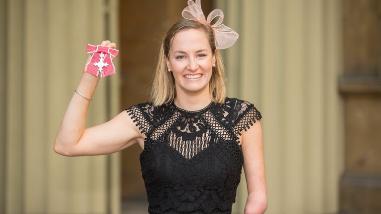 Claire Cashmore at Buckingham Palace in 2017 after receiving her MBE for services to swimming from the Prince of Wales