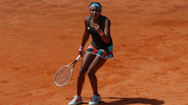 Coco Gauff of the United States celebrates after winning her 3rd round match against Aryna Sabalenka of Belarus at the Italian Open tennis tournament, in Rome, Thursday, May 13, 2021. (AP Photo/Alessandra Tarantino)