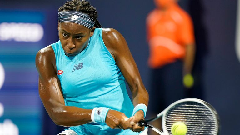 Coco Gauff returns a shot from Anastasija Sevastova, of Latvia, during the Miami Open tennis tournament, Thursday, March 25, 2021 in Miami Gardens, Fla. (AP Photo/Wilfredo Lee)