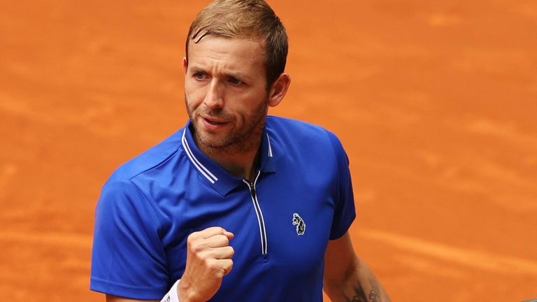 Dan Evans of Great Britain celebrates after winning a point during his match against Jeremy Chardy of France at La Caja Magica on May 03, 2021 in Madrid, Spain. (Photo by Clive Brunskill/Getty Images)
