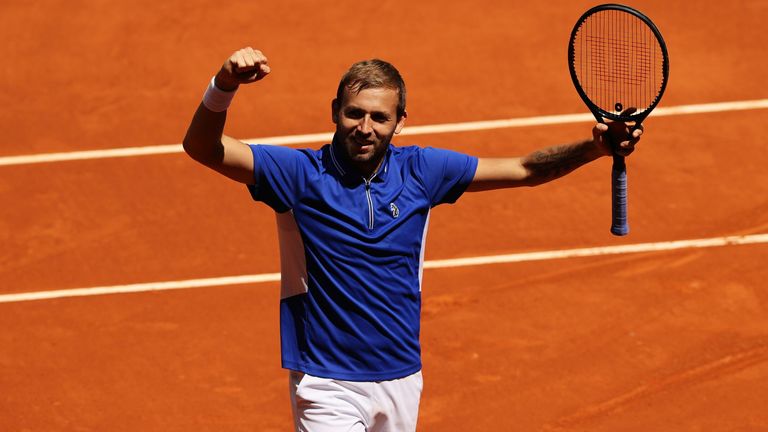 Dan Evans of Great Britain celebrates after winning match point during his match against Jeremy Chardy of France at La Caja Magica on May 03, 2021 in Madrid, Spain. (Photo by Clive Brunskill/Getty Images)