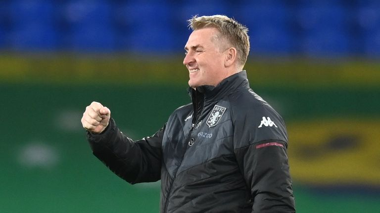 Dean Smith is all smiles after Aston Villa's late win at Everton