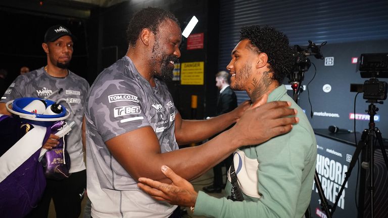 *** FREE FOR EDITORIAL USE ***.Derek Chisora vs Joseph Parker, Heavyweight Contest..2 May 2021.Picture By Dave Thompson Matchroom Boxing..Derek Chisora speaks with Conor Benn after losing the contest. 