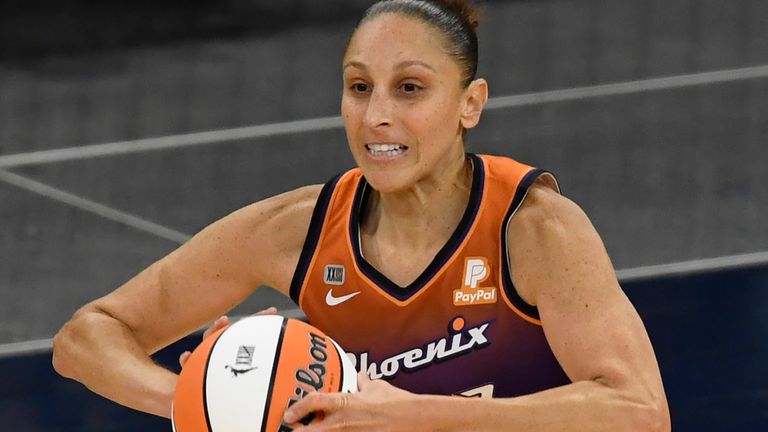 Phoenix Mercury guard Diana Taurasi (3) passes the ball during a WNBA basketball game, Friday, May 14, 2021, in Minneapolis. (AP Photo/Hannah Foslien)