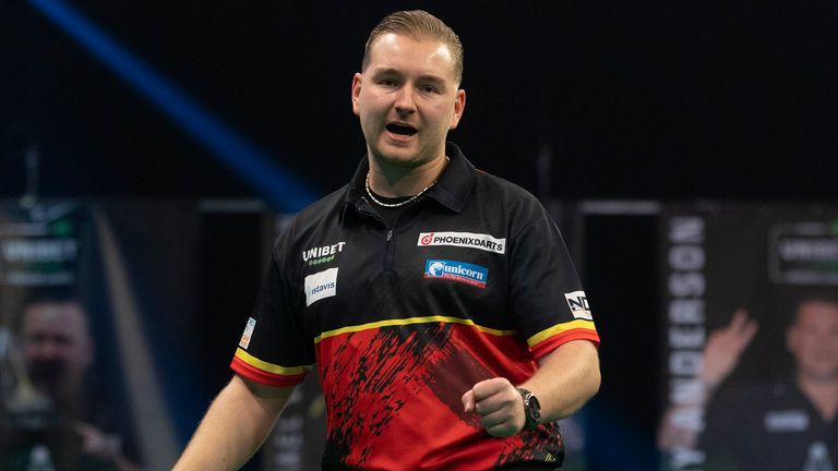 Dimitri Van den Bergh got the better of table topper Nathan Aspinall to open up the battle for top spot in the 2021 Premier League (Picture: Lawrence Lustig)