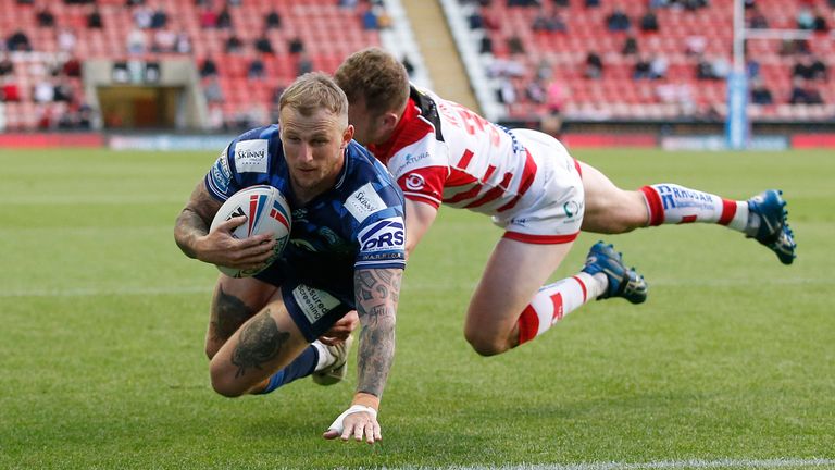 Wigan Warriors' Dom Manfredi scores their second try