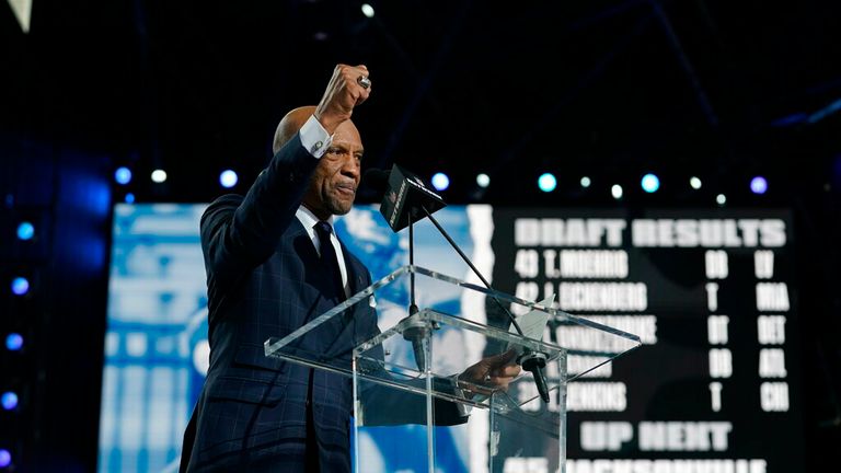 Drew Pearson announces the Dallas Cowboys pick during the second round of the NFL Draft on Friday, April 30, 2021, in Cleveland. (AP Photo/Steve Luciano)