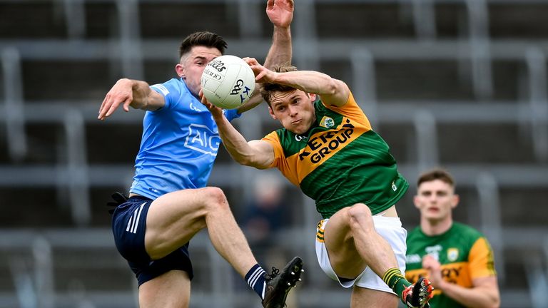 Gavin White of Kerry fields a high ball ahead of David Byrne of Dublin