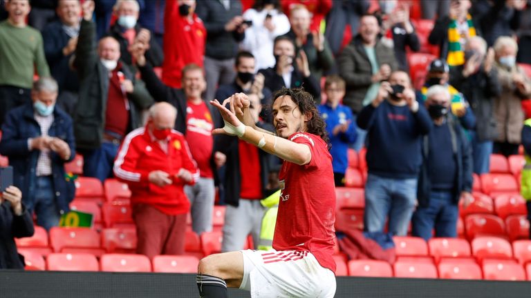 Edinson Cavani celebrates his goal in front of Man Utd at Old Trafford (AP)