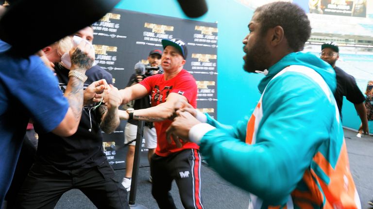 Floyd Mayweather scuffles with Jake Paul at media event to ...