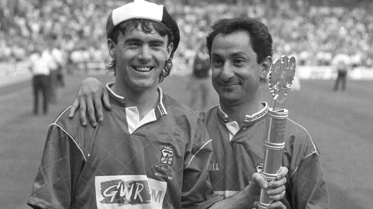 Alan McLoughlin and manager Ossie Ardiles celebrate with the Barclays League Division Two playoff final trophy in 1990