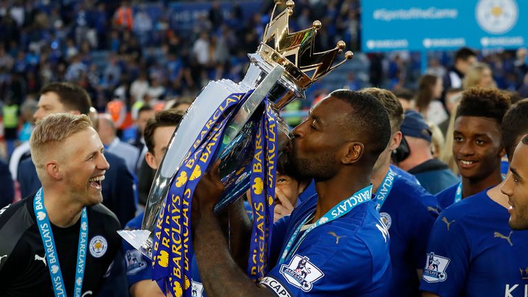 Wes Morgan with the Premier League trophy in 2016