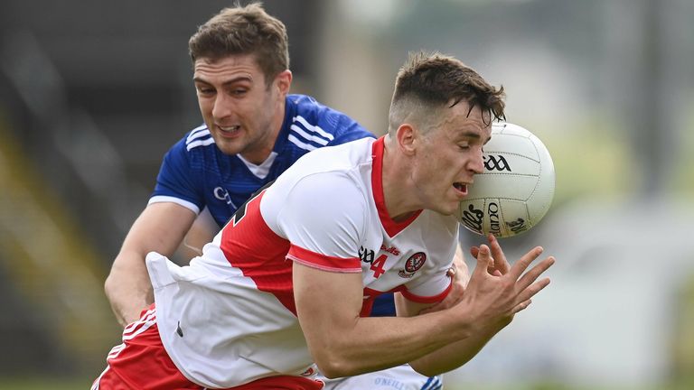 Shane McGuigan of Derry in action against Killian Clarke of Cavan