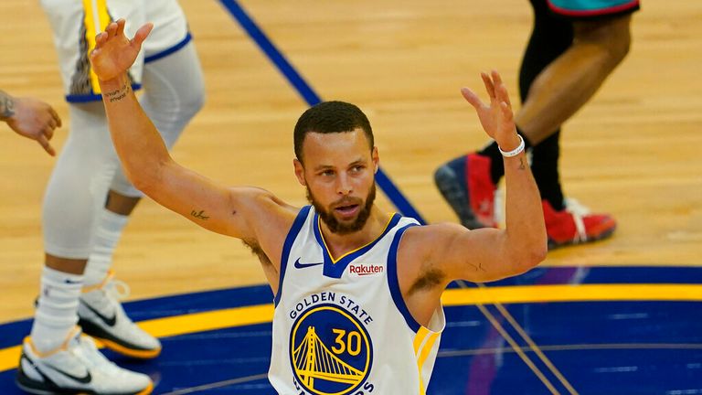 Golden State Warriors guard Stephen Curry (30) reacts after shooting a 3-point basket against the Memphis Grizzlies during the second half of an NBA basketball game in San Francisco, Sunday, May 16, 2021. (AP Photo/Jeff Chiu)