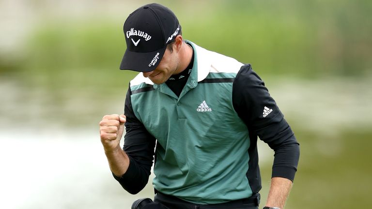 Guido Migliozzi reacts after making a par at the 18th in the final round of the British Masters