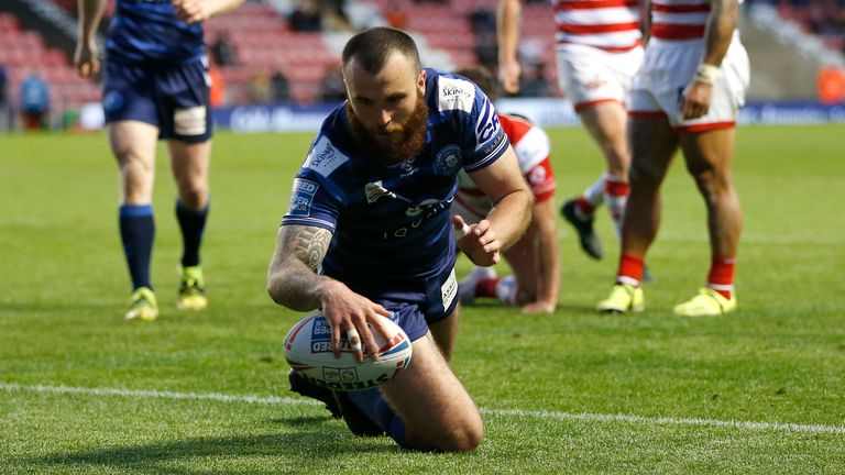 Picture by Ed Sykes/SWpix.com - 17/05/2021 - Rugby League - Betfred Super League Round 6 - Leigh Centurions v Wigan Warriors - Leigh Sports Village, Leigh , England - Wigan Warriors' Jake Bibby scores their sixth try