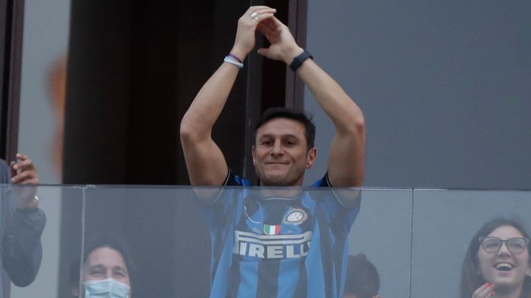 Inter Milan vice-president Javier Zanetti celebrates after Inter Milan won its first Serie A title in more than a decade after second-placed Atalanta drew 1-1 at Sassuolo, in Milan, Italy, Sunday, May 2, 2021. Atalanta needed to win to avoid Inter mathematically clinching the title with four matches remaining. It was Inter...s first trophy since 2011 and the first Serie A title since 2010. (AP Photo/Luca Bruno)                                                