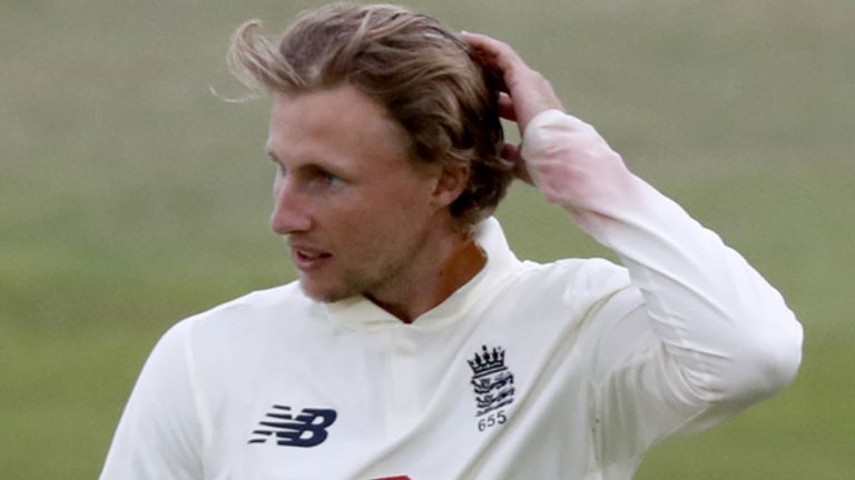 PA - August 2020. England Captain Joe Root (second right) and Dom Sibley walk off with the umpires as bad light stops play during day four of the third Test match at the Ageas Bowl, Southampton.