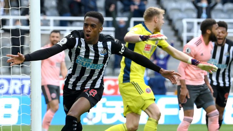 Joe Willock wheels away from goal after giving Newcastle the lead