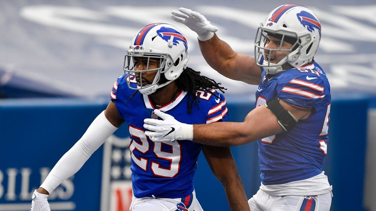 Norman (29) celebrates his touchdown against the Miami Dolphins with linebacker Matt Milano (58). (AP Photo/Adrian Kraus)
