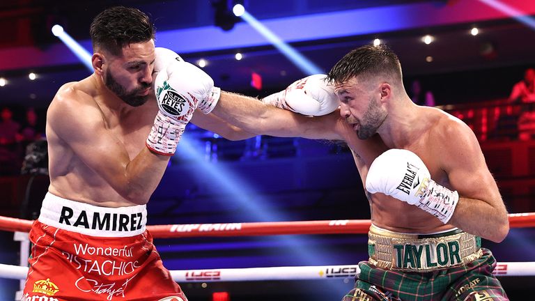 LAS VEGAS, NEVADA - MAY 22: Jose Ramirez(L) and Josh Taylor(R) exchange punches during their fight for the Undisputed junior welterweight championship at Virgin Hotels Las Vegas on May 22, 2021 in Las Vegas, Nevada. (Photo by Mikey Williams/Top Rank Inc via Getty Images).