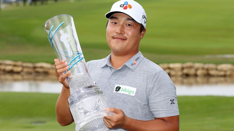 K.H. Lee of South Korea celebrates with the trophy after winning the AT&T Byron Nelson at TPC Craig Ranch on May 16, 2021 in McKinney, Texas. Lee won the AT&T Byron Nelson playing -25 in the tournament. 
