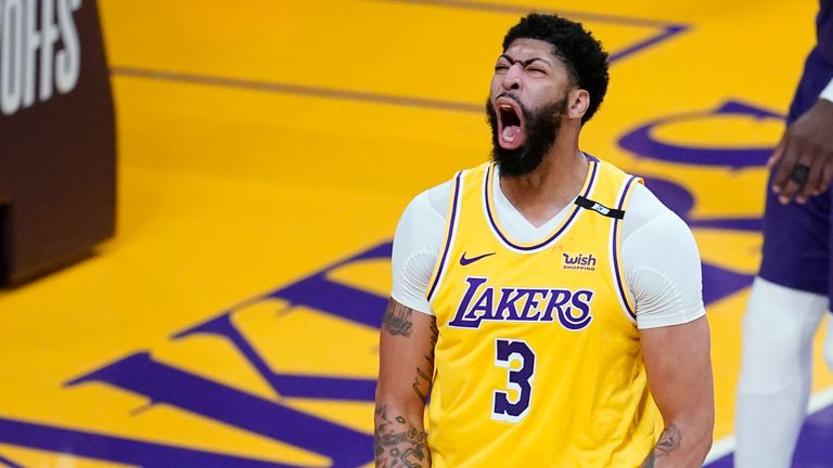 Los Angeles Lakers forward Anthony Davis celebrates after scoring during the second half in Game 3 of an NBA basketball first-round playoff series against the Phoenix Suns