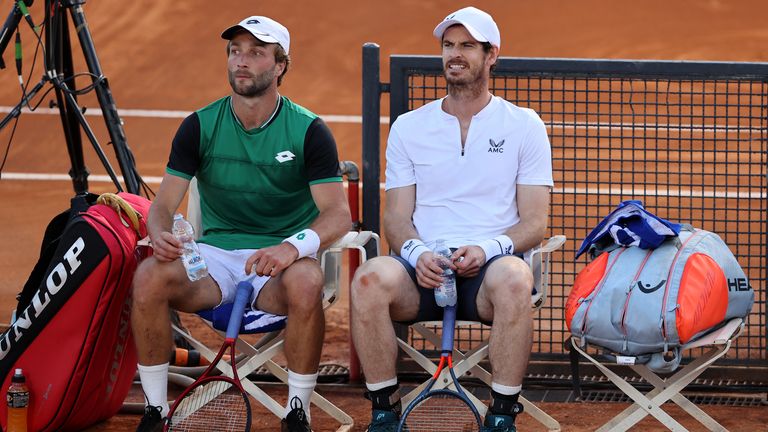 Liam Broady and Andy Murray (R), both of Great Britain speak to each other between games on day 5 of the Internazionali BNL d’Italia match between Max Purcell and Luke Saville, both of Australia against Liam Broady and Andy Murray, both of Great Britain at Foro Italico on May 12, 2021 in Rome, Italy. 