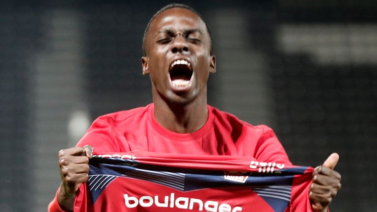 Timothy Weah celebrates Lille's Ligue 1 victory