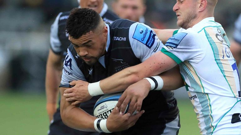 Newcastle Falcons' Luther Burrell looks to get through the Saints defence