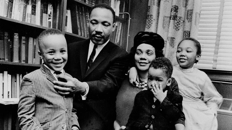 Dr. Martin Luther King Jr. and his wife, Coretta Scott King, sit with three of their four children in their Atlanta, Ga, home, on March 17, 1963. From left are: Martin Luther King III, 5, Dexter Scott, 2, and Yolanda Denise, 7