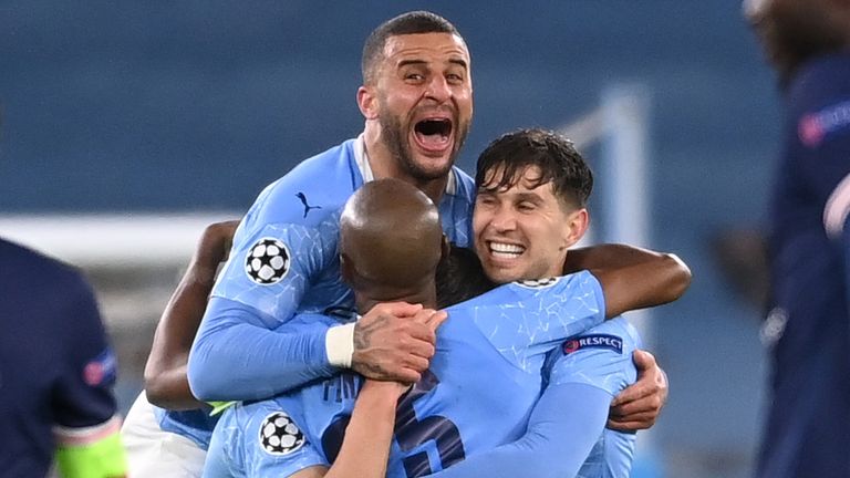 Man City players celebrate reaching the club's first Champions League final