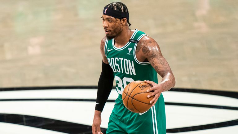 Boston Celtics guard Marcus Smart drives up the court in the first-round playoff series against the Brooklyn Nets