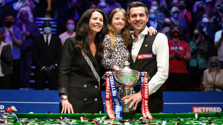 Mark Selby posses with his wife and daughter after winning the the Betfred World Snooker Championships 2021 at The Crucible, Sheffield. Picture date: Monday May 3, 2021.