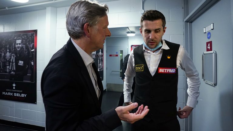 Mark Selby talks with his coach Chris Henry after winning the the Betfred World Snooker Championships 2021 at The Crucible, Sheffield. Picture date: Monday May 3, 2021.