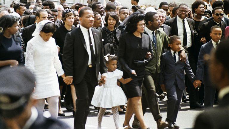 The family of slain civil rights leader Dr. Martin Luther King, Jr., walk in the funeral procession in Atlanta, April 9, 1968. From left: daughter Yolanda, 12; King's brother A.D. King; daughter Bernice, 5; widow Coretta Scott King; Rev. Ralph Abernathy; sons Dexter, 7, and Martin Luther King III, 10
