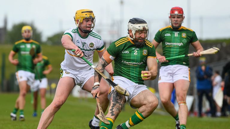 Michael Burke of Meath in action against Killian Sampson of Offaly