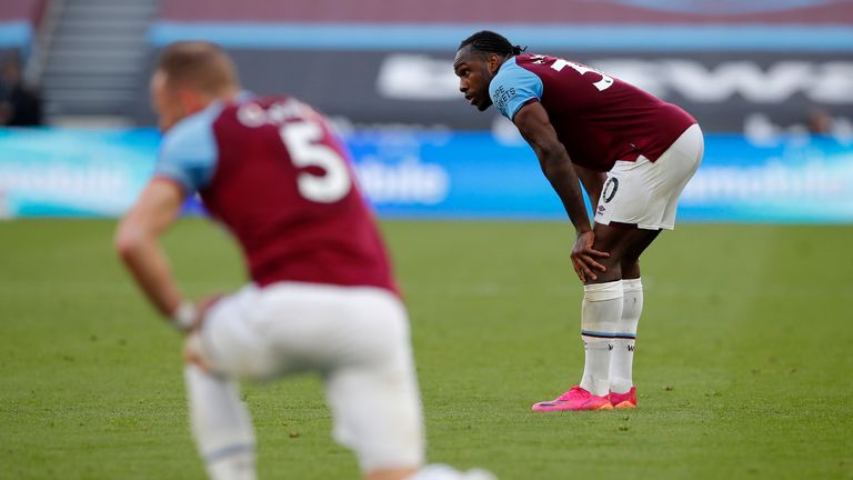 Michail Antonio looks dejected at the final whistle
