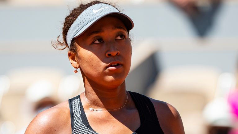 Naomi Osaka of Japan celebrates during her match against Patricia Maria Țig of Romania in the first round of the women’s singles at Roland Garros on May 30, 2021 in Paris, France.