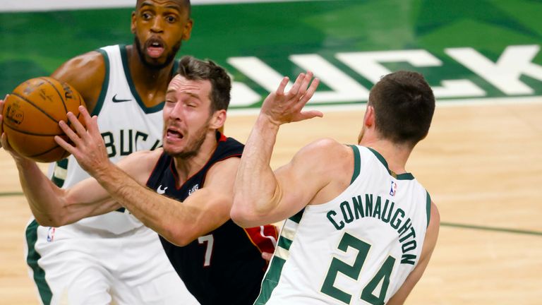 Miami Heat guard Goran Dragic (7) drives against the Milwaukee Bucks during the first half of Game 2 of an NBA basketball first-round playoff series Monday, May 24, 2021, in Milwaukee.