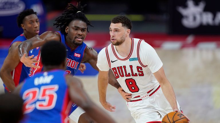 Chicago Bulls guard Zach LaVine (8) drives as Detroit Pistons center Isaiah Stewart defends during the second half of an NBA basketball game, Sunday, May 9, 2021, in Detroit. (AP Photo/Carlos Osorio)


