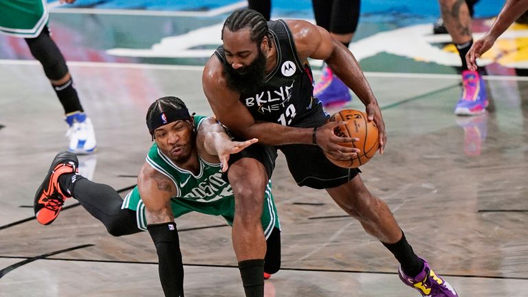 Boston Celtics guard Marcus Smart (36) tries to get the ball from Brooklyn Nets guard James Harden (13) during the second quarter of Game 2 of an NBA basketball first-round playoff series Tuesday, May 25, 2021, in New York. (AP Photo/Kathy Willens)


