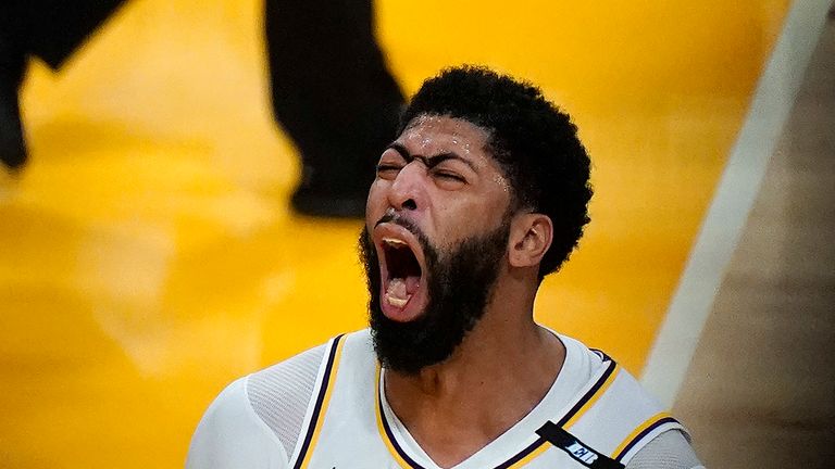 Los Angeles Lakers forward Anthony Davis celebrates after scoring during the second half of the team&#39;s NBA basketball game against the Phoenix Suns on Sunday, May 9, 2021, in Los Angeles. (AP Photo/Marcio Jose Sanchez)


